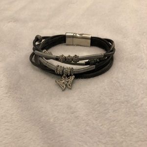 Rustic leather bracelet with butterfly charm